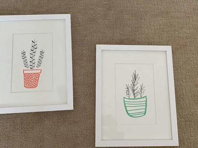 Two White Framed Potted Plants Prints