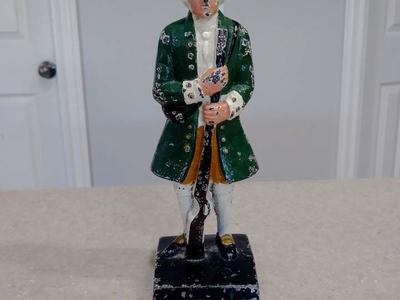 Cast iron colonial solder bookend door stop