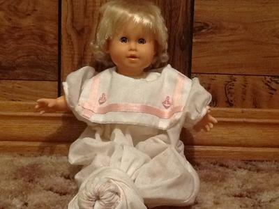 Baby doll eyes open and close as you tilt her