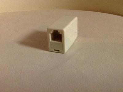 Landline telephone cord coupling