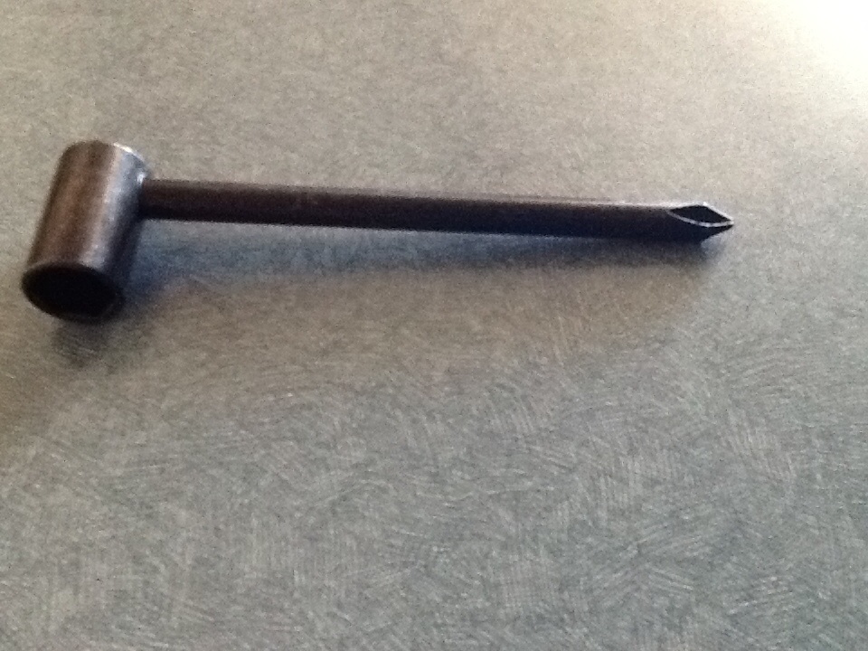 Dual purpose mini hand tool Phillips head screwdriver on one end and 8MM socket on the other end