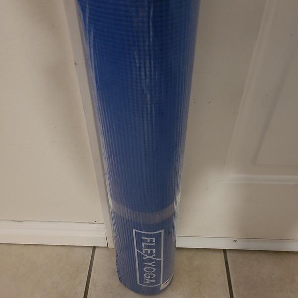 New blue yoga mat 24" X 68" 1/4" thick 