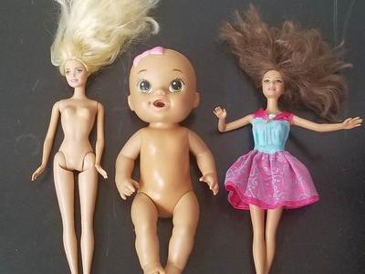 2 Barbies and one Pink Bow Hasbro Doll.