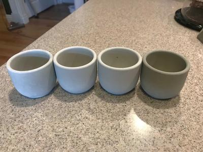 4 of small concrete planters with drainage hole