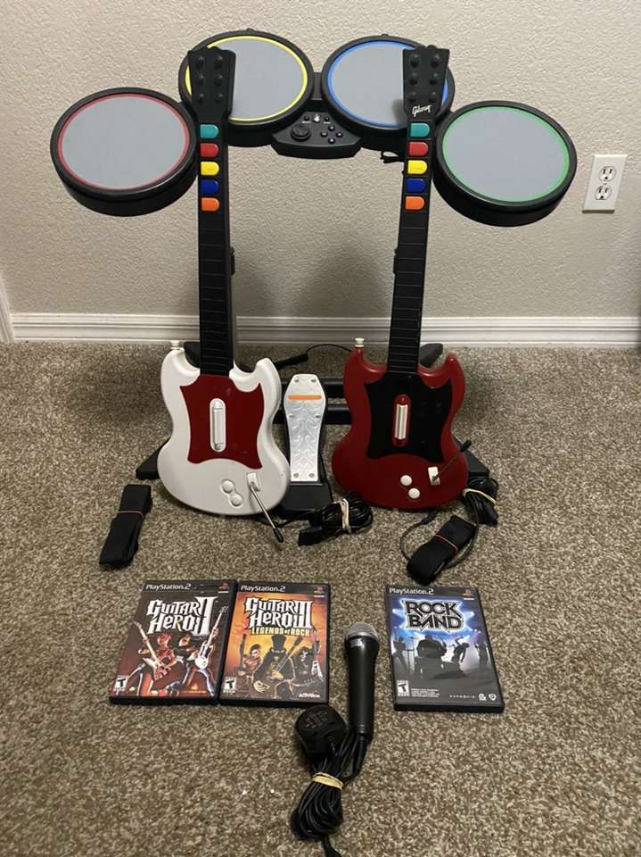 PlayStation 2 Rock Band Guitar Hero. Console Avail