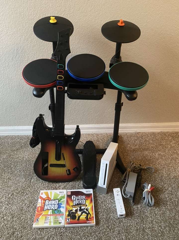 Wii Guitar Hero Band Hero Sets. Read Below