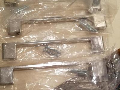 4 new kitchen or bath cabinet handles.