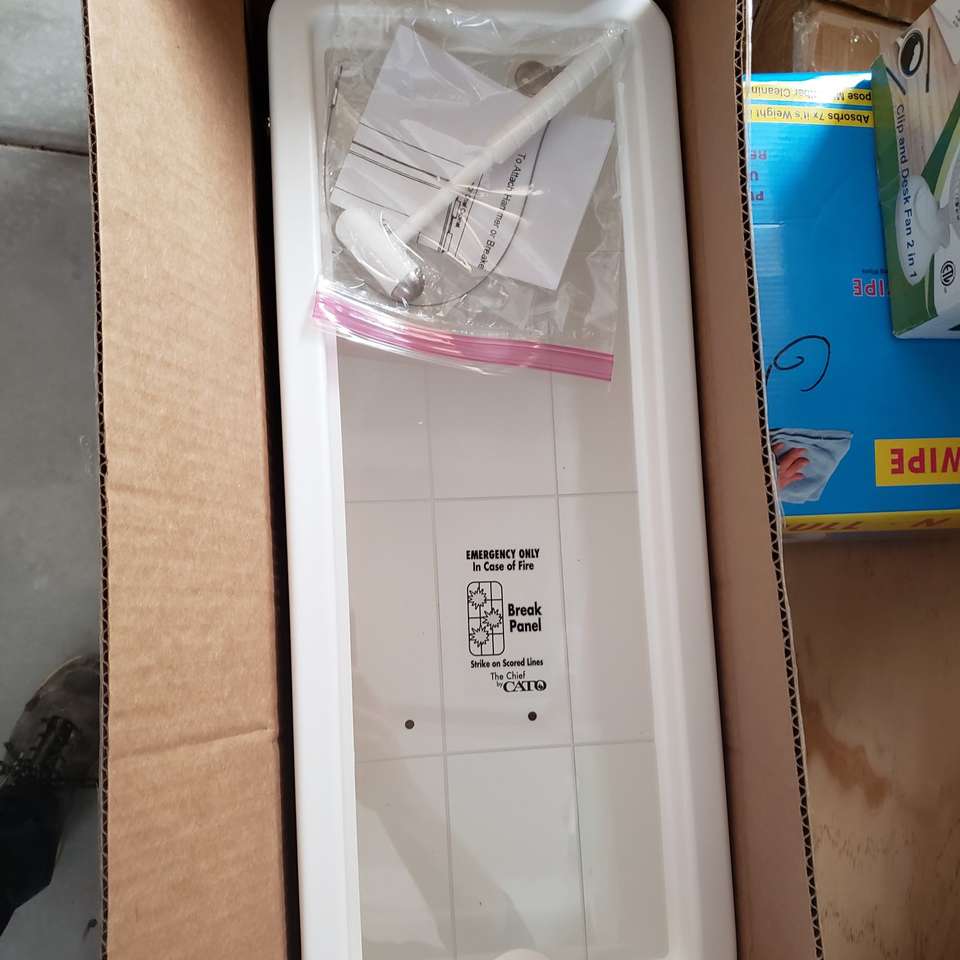 Emergency fire extenquisher wall holder