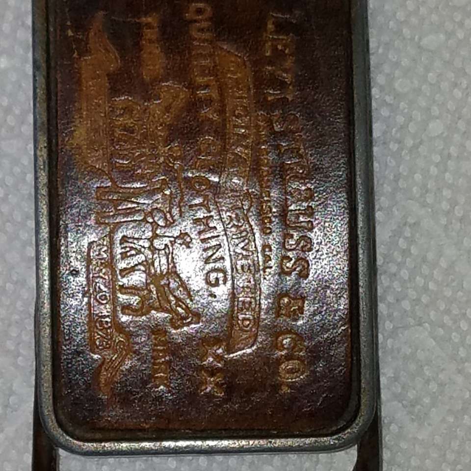 Vintage leather Levis Strauss belt buckle