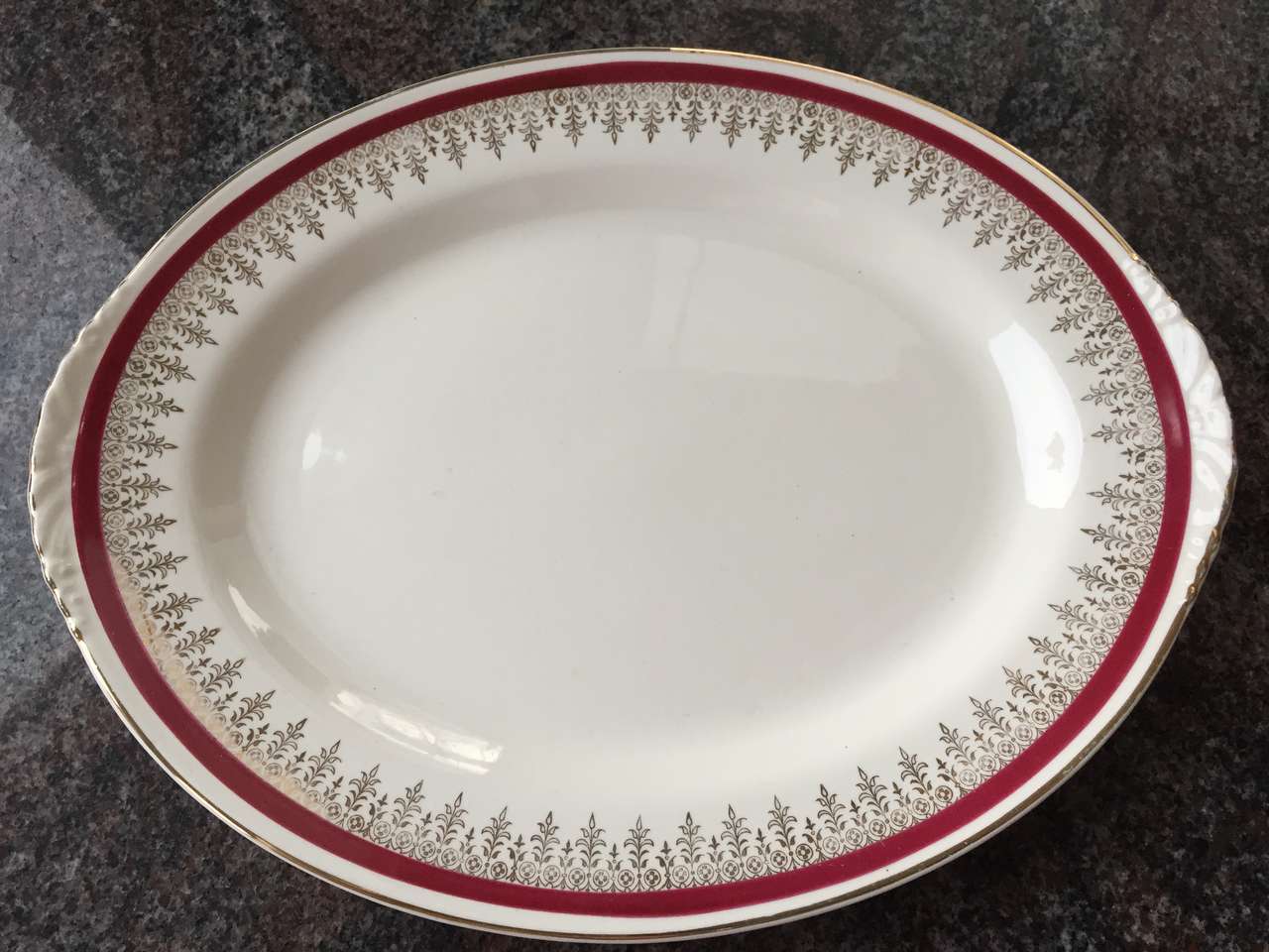 Homer Laughlin oval serving platter gold, dk red band