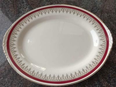 Homer Laughlin oval serving platter gold, dk red band