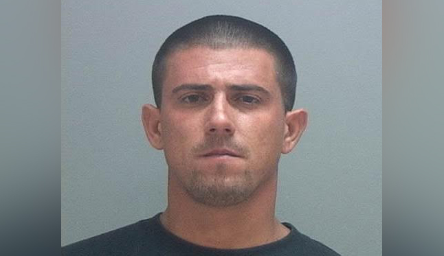 Man arrested for shooting woman during burglary, police say