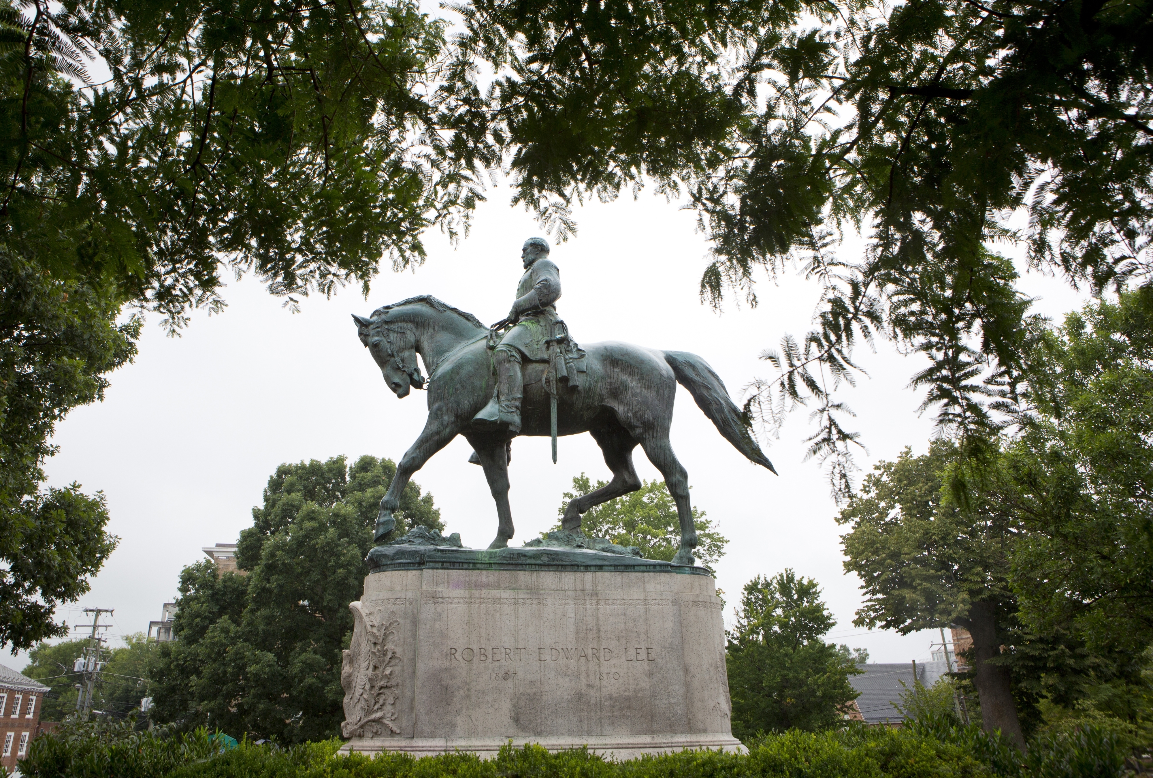 What role do statues play in remembering history?