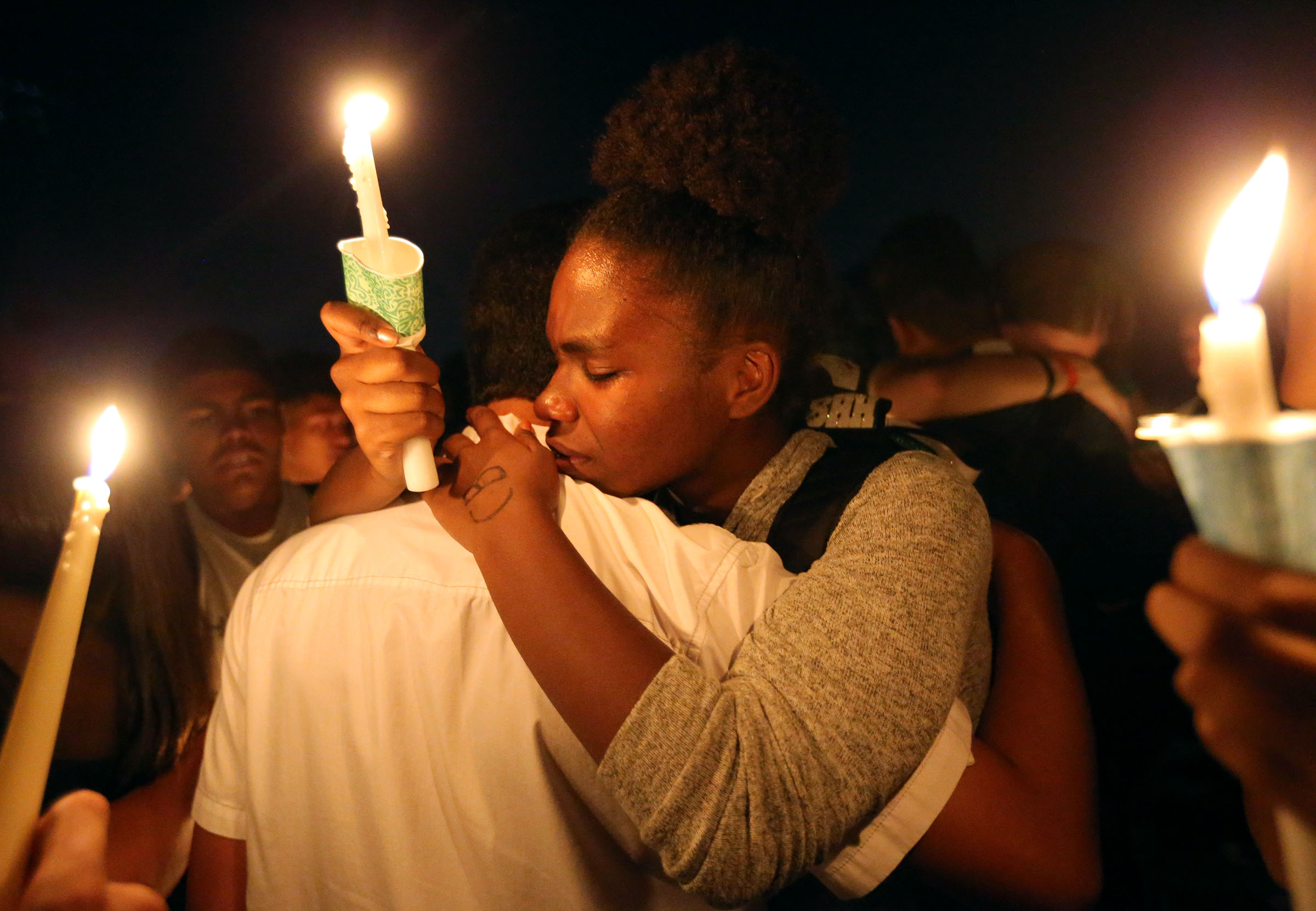 Hillcrest coach honored at candlelight vigil: 'He just inspired me'