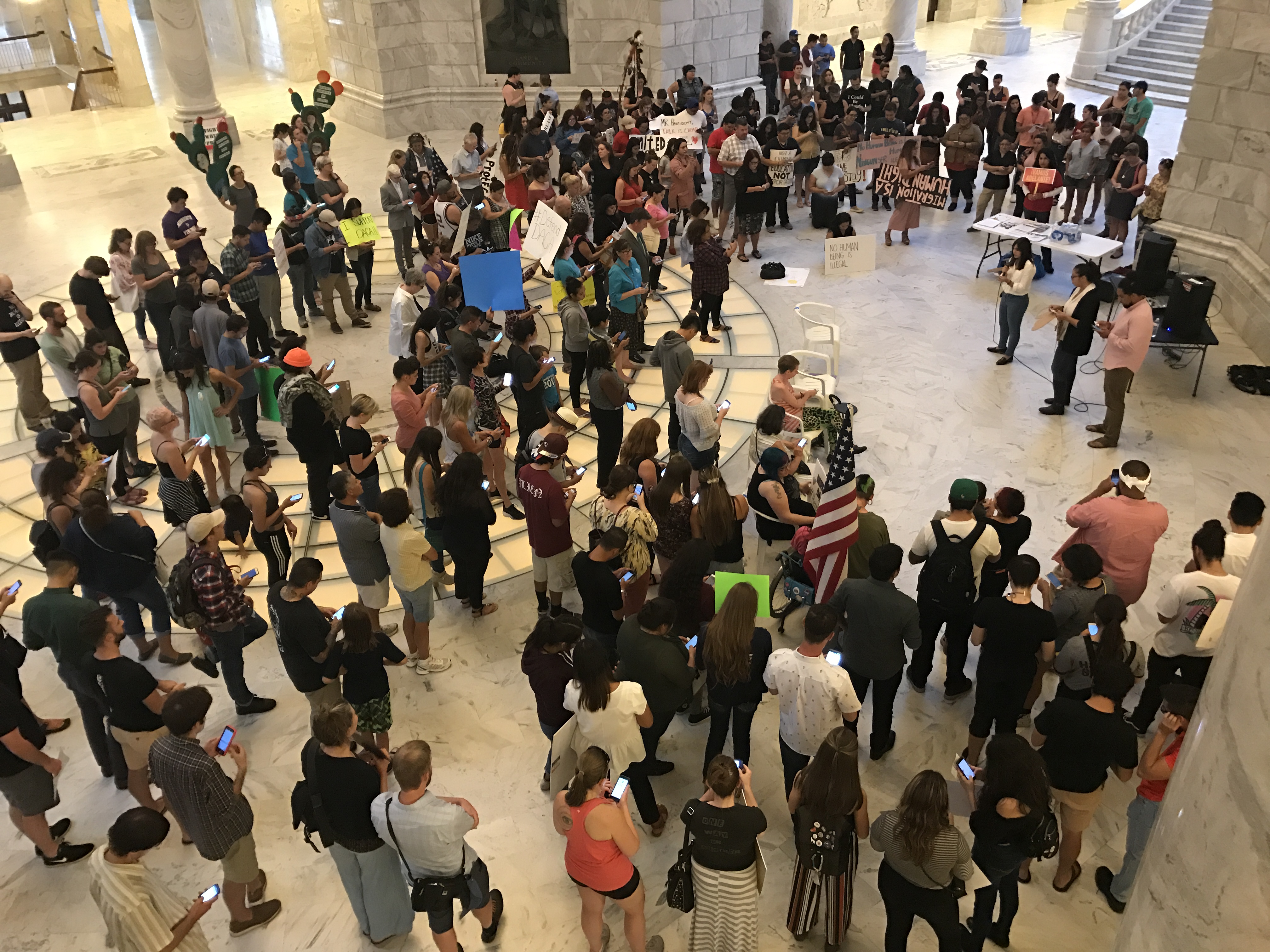 'Here to stay': Nearly 200 rally for deferred action program for immigrants