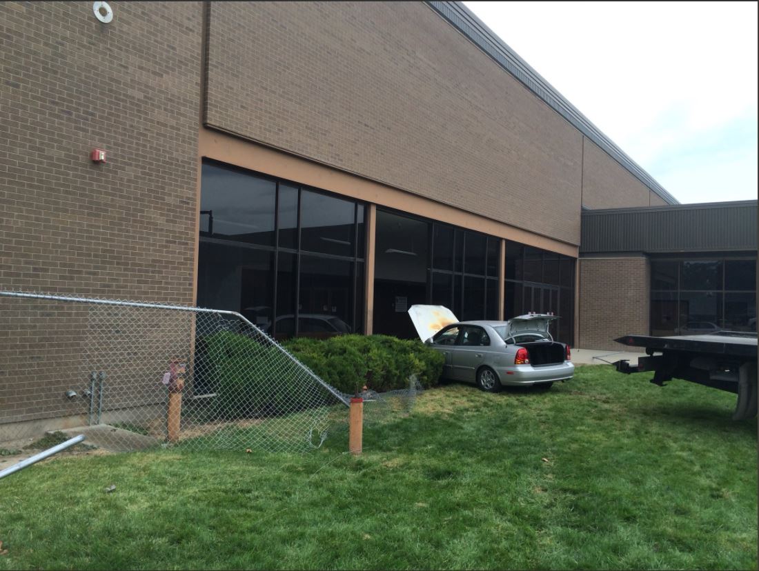 Man arrested after crashing car into Taylorsville school