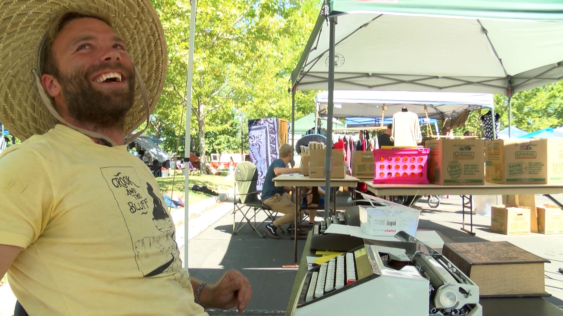 S.L. flea market features old-fashioned texting via old typewriter