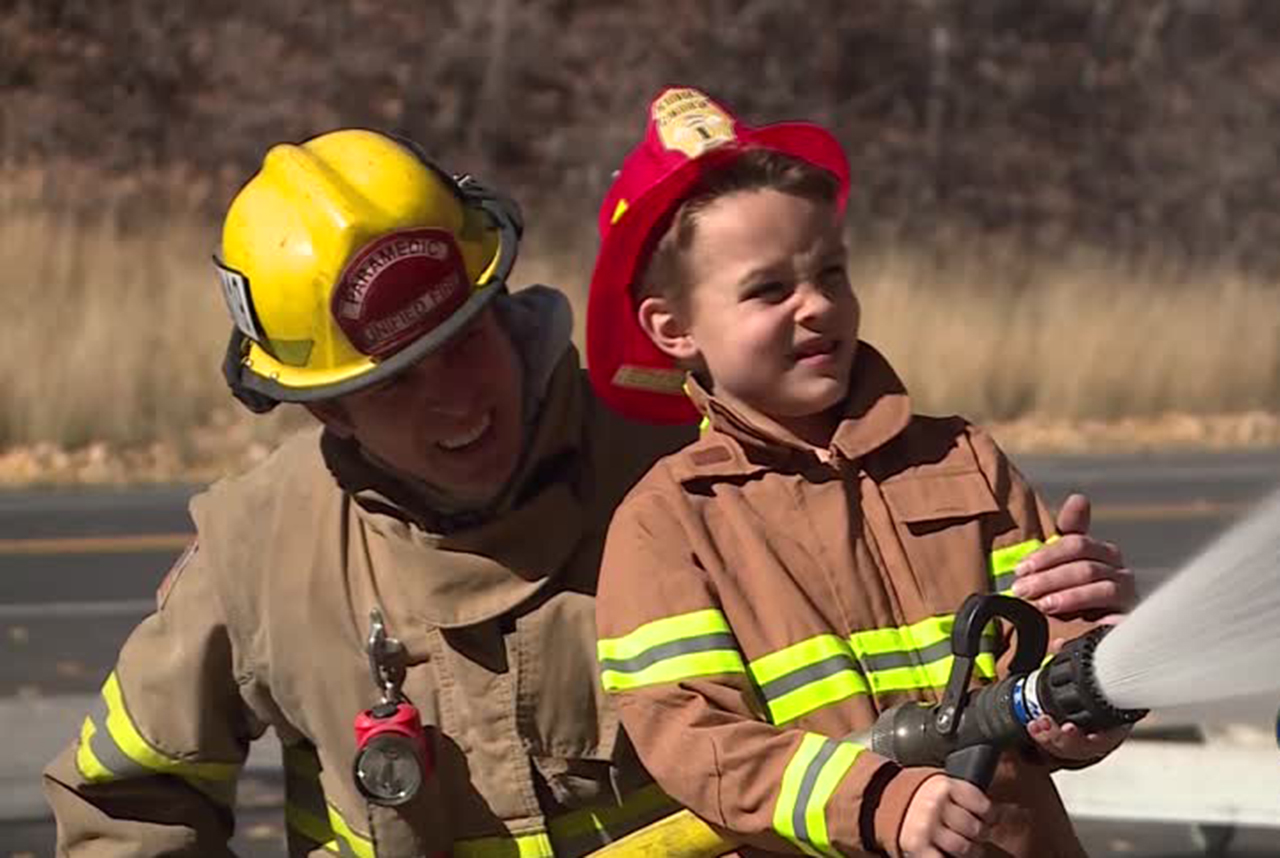 8-year-old calls the shots as firefighter for a day