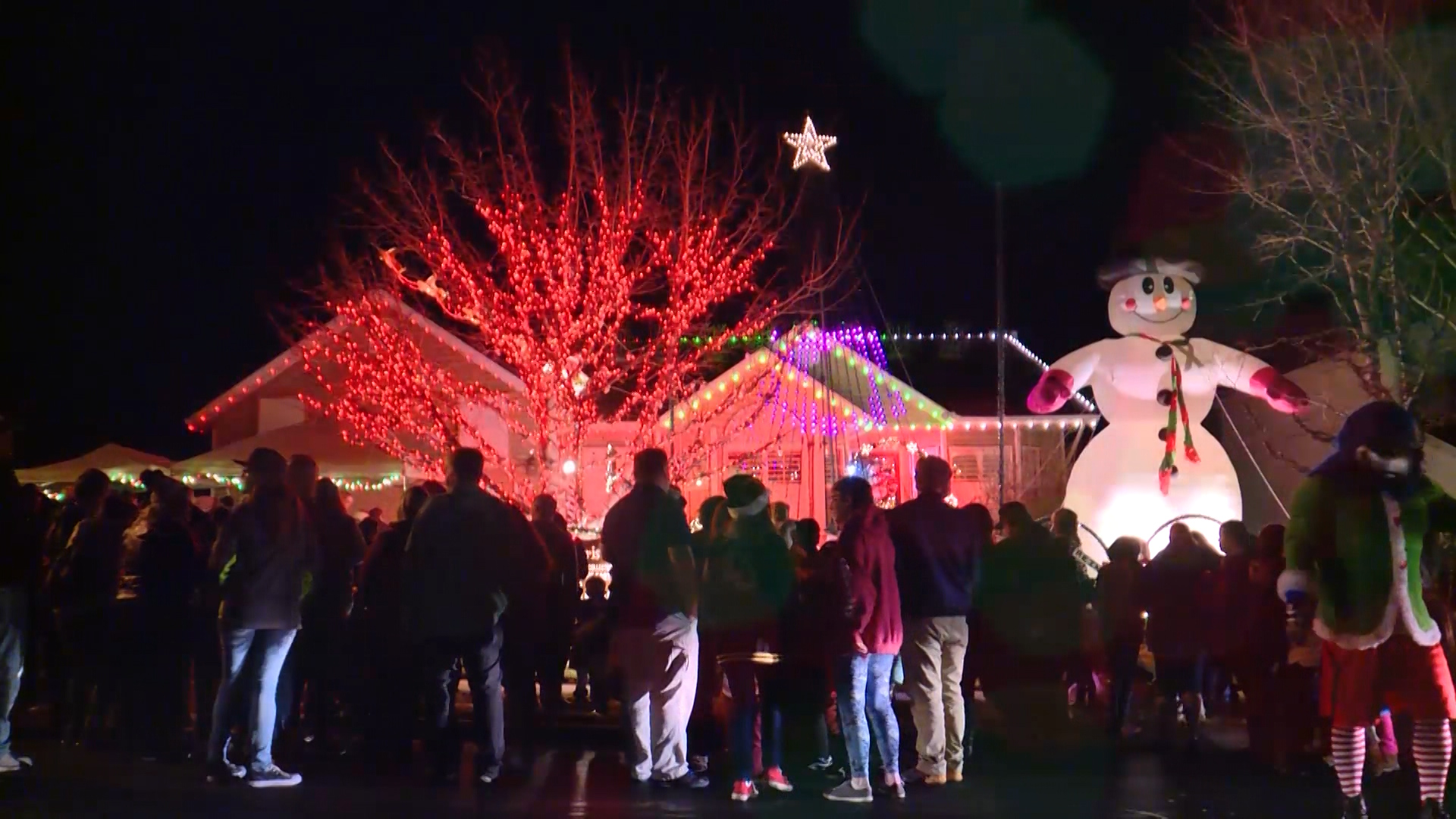 Neighborhood comes together to light up home for kids in need