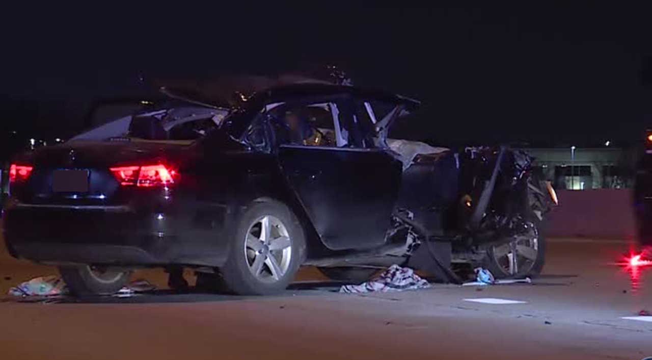 Woman critically injured after car hits semitruck on I-15