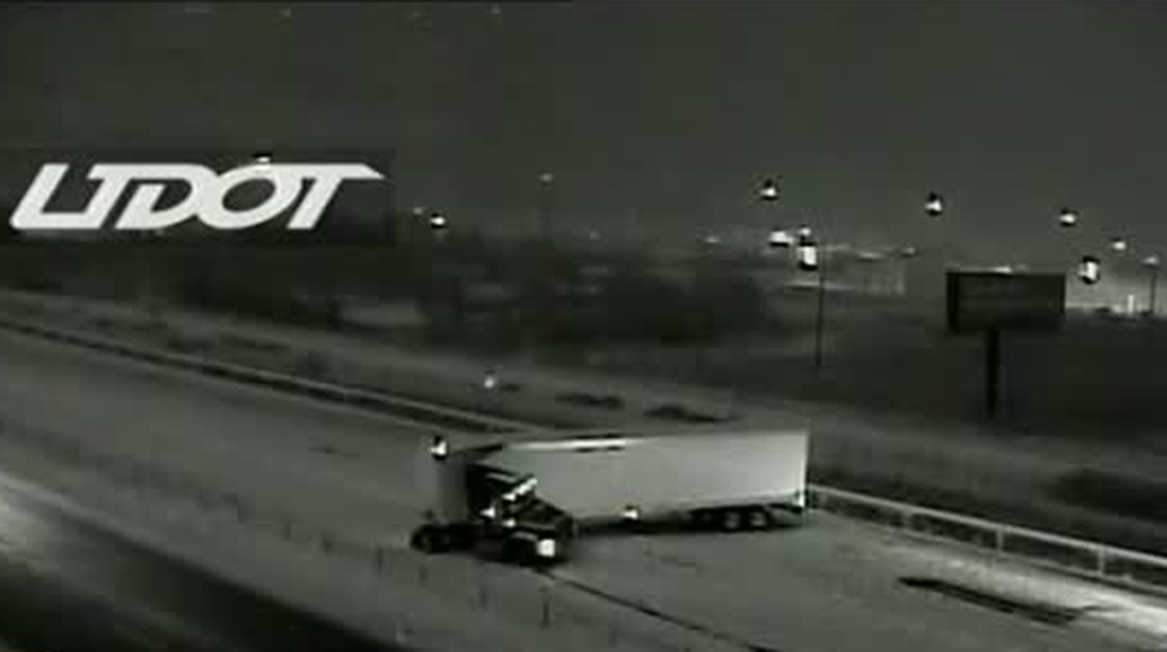 Jackknifed semitruck closes eastbound I-215 at north interchange