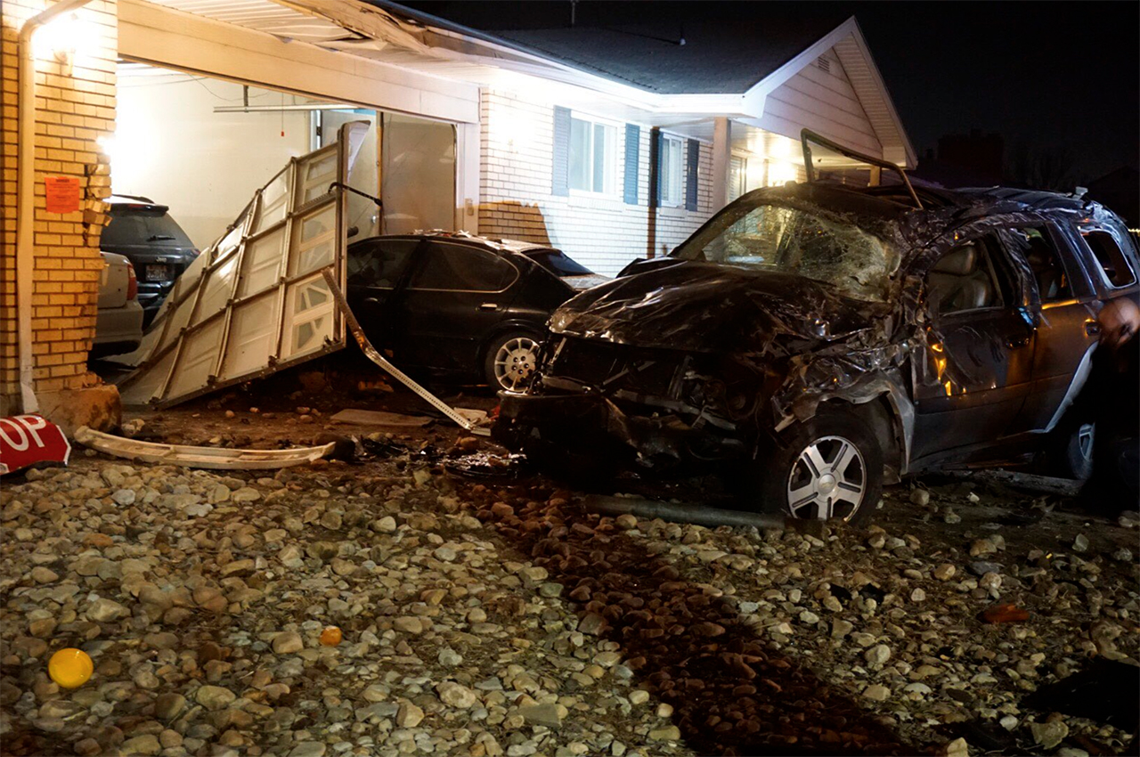 2 cars crash into garage; police seek juvenile driver