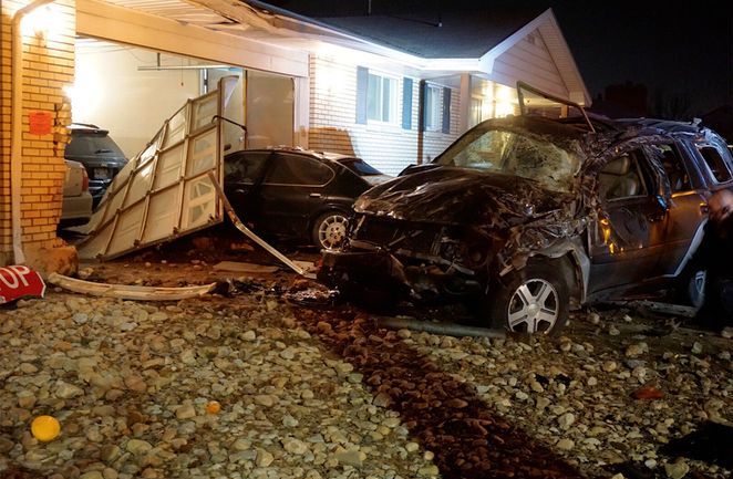 Teens crash cars onto Midvale property, damaging garage