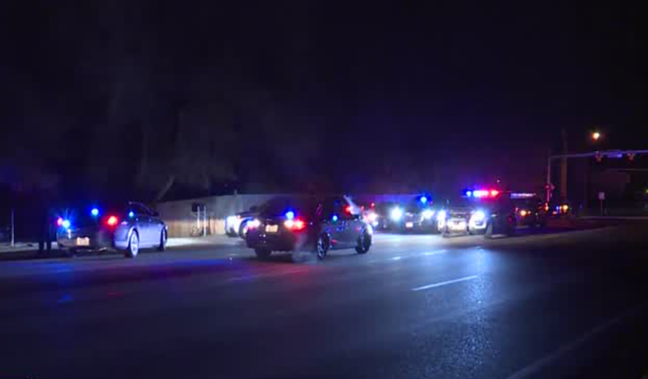 Several people in custody after police car tire slashed