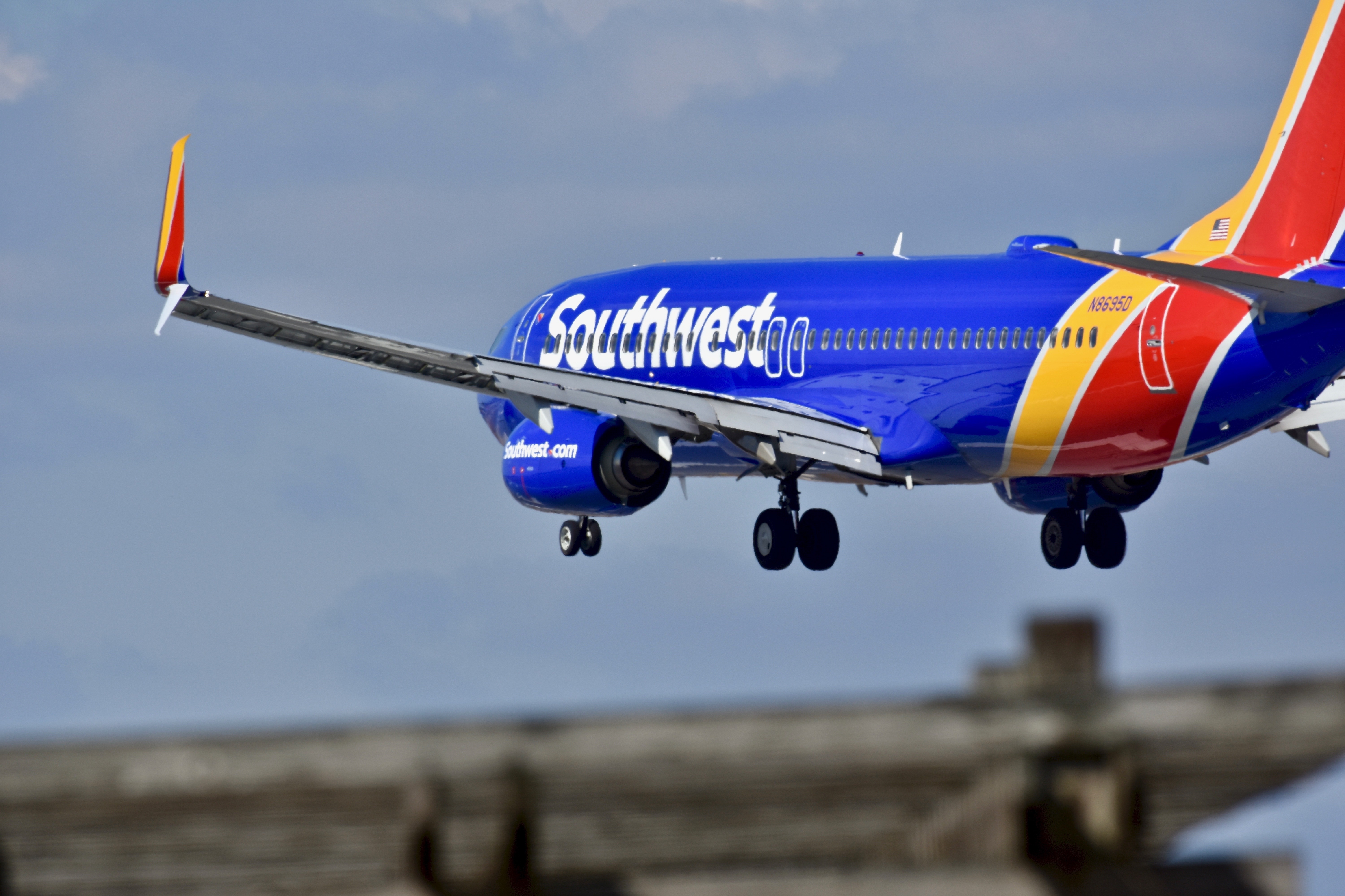 Southwest flight makes emergency landing in S.L.; witnesses report seeing flames