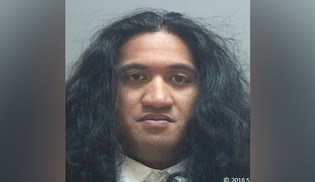 Ex-U. football player in custody 4.5 years after arrest warrant issued
