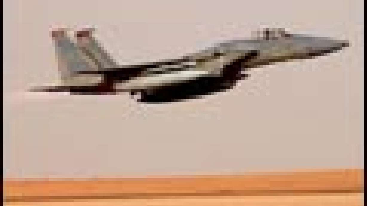 Warplanes Attack Iraqi Armored Vehicles