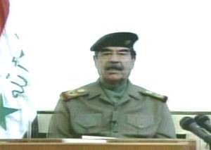 Iraqis Flee, Armored Convoys Press in from the South