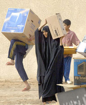 Liberated Iraqis Topple Statue, Celebrate