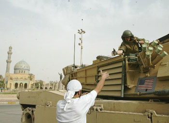 Liberated Iraqis Topple Statue, Celebrate