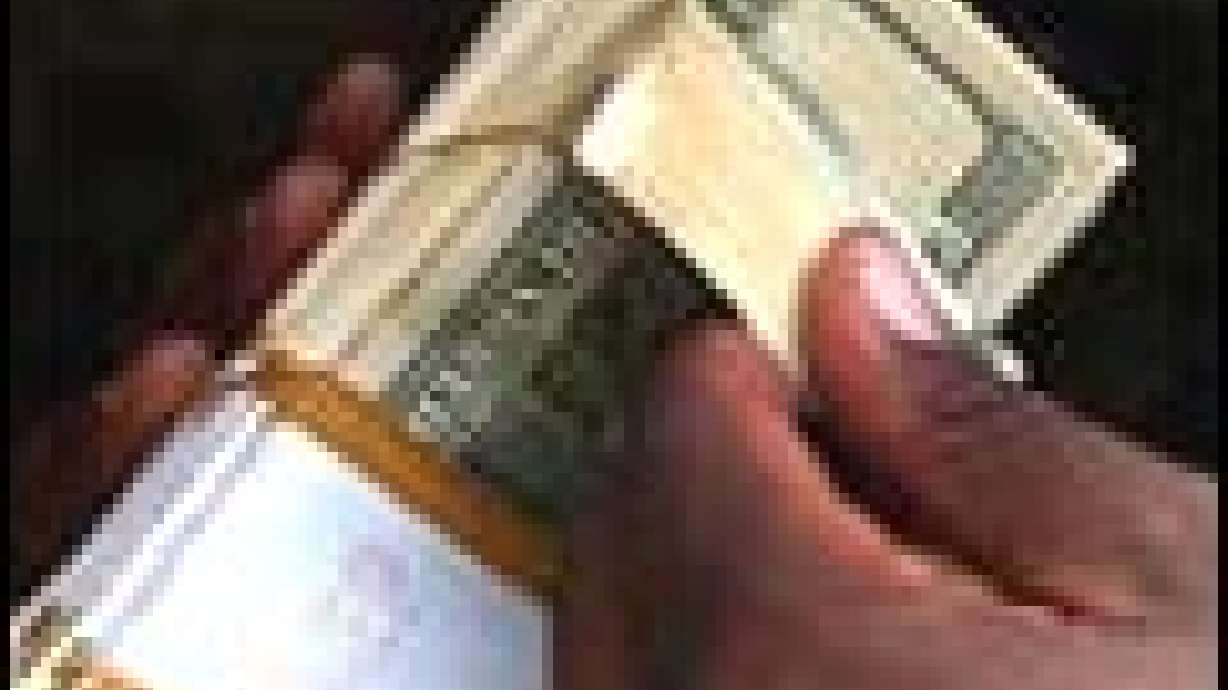 Iraqis Exchange 'Saddams' for New Currency