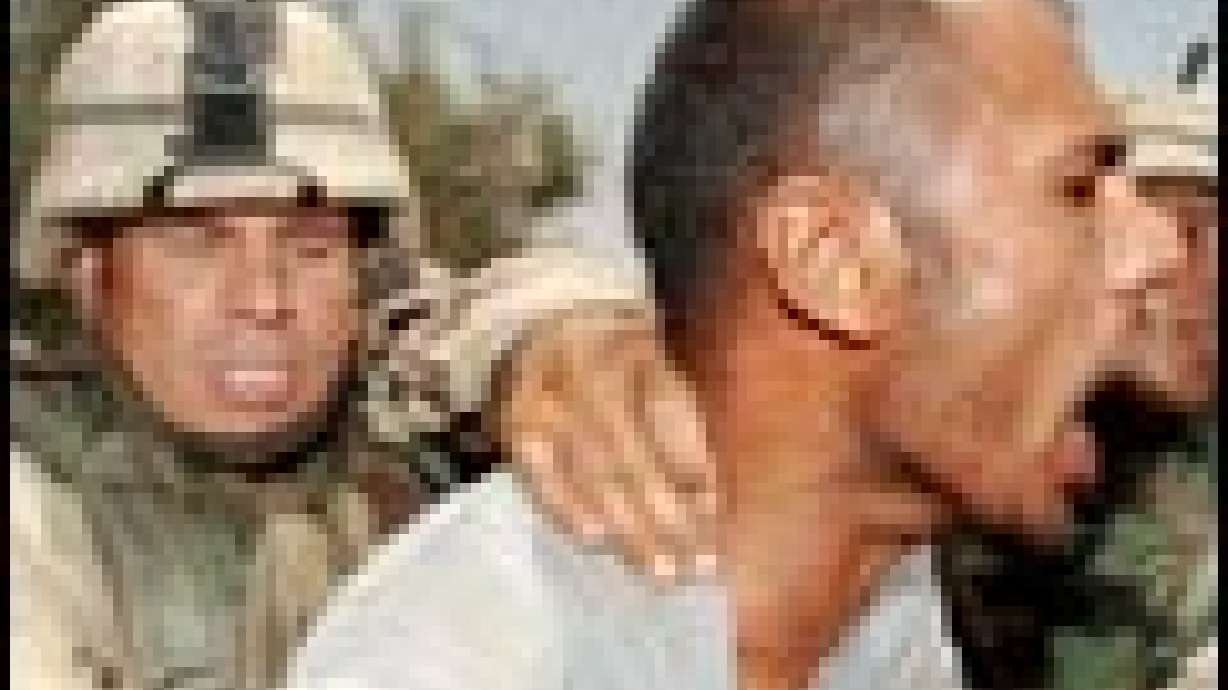 20 Die in Iraq Protest; 2 Marines Killed