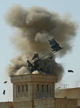 U.S. Soldiers Blow Up Saddam Statue