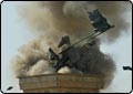 U.S. Soldiers Blow Up Saddam Statue
