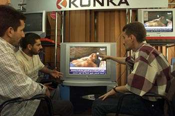 Media Views Bodies of Hussein Brothers