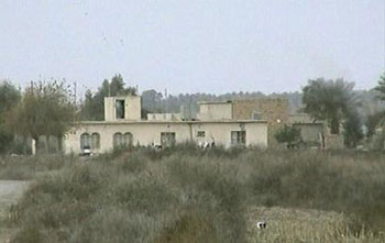 Chamber Beneath Mud Hut Leads to Hussein