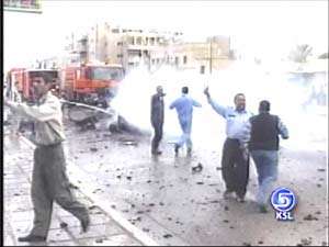 Car Bomb Kills 4 Iraqis Outside Hotel