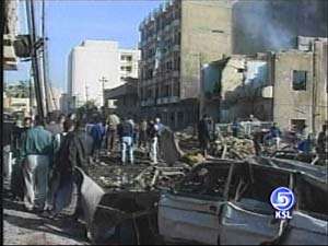 Car Bomb Kills 4 Iraqis Outside Hotel