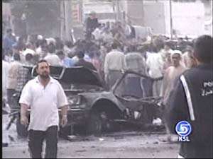Car Bomb Kills 4 Iraqis Outside Hotel