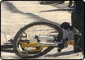 Man on Bike Hit by Dump Truck