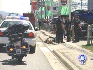 Man on Bike Hit by Dump Truck
