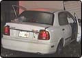 Car Crashes Into Garage
