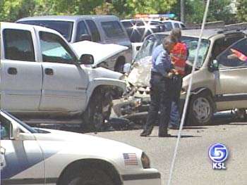 Head-on Collision Critically Injures Woman, Child