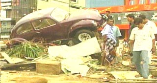 Asia's Death Toll Soars Above 58,000; Officials Warn of Disease