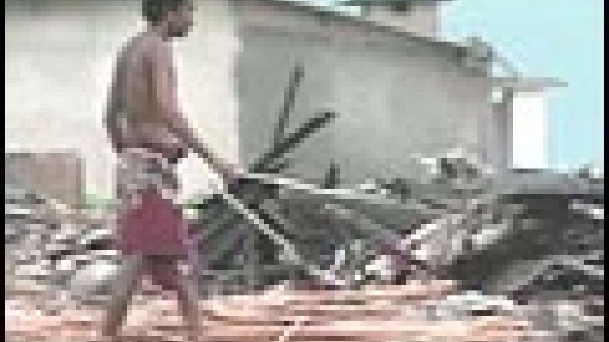 Helicopter Crash, Aftershocks Rattle Tsunami Relief Effort