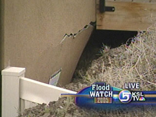 Mudslide Begins to Crush Hillside Homes